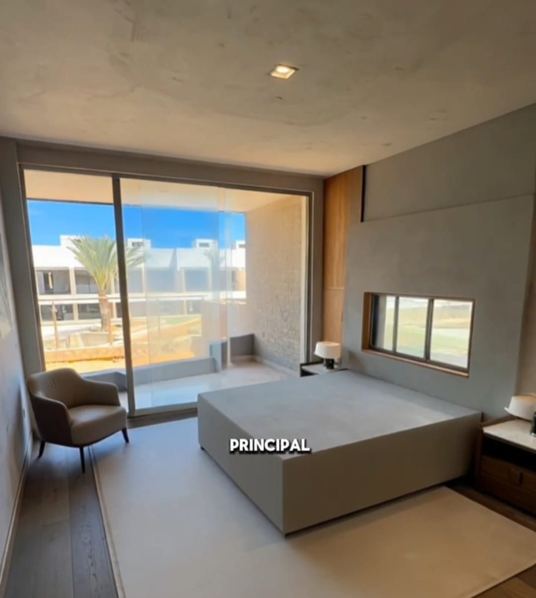 Bedroom with balcony view